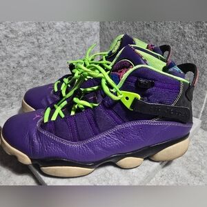 The shoes in the image are the Air Jordan 6 Rings "Bel Air" sneakers. 